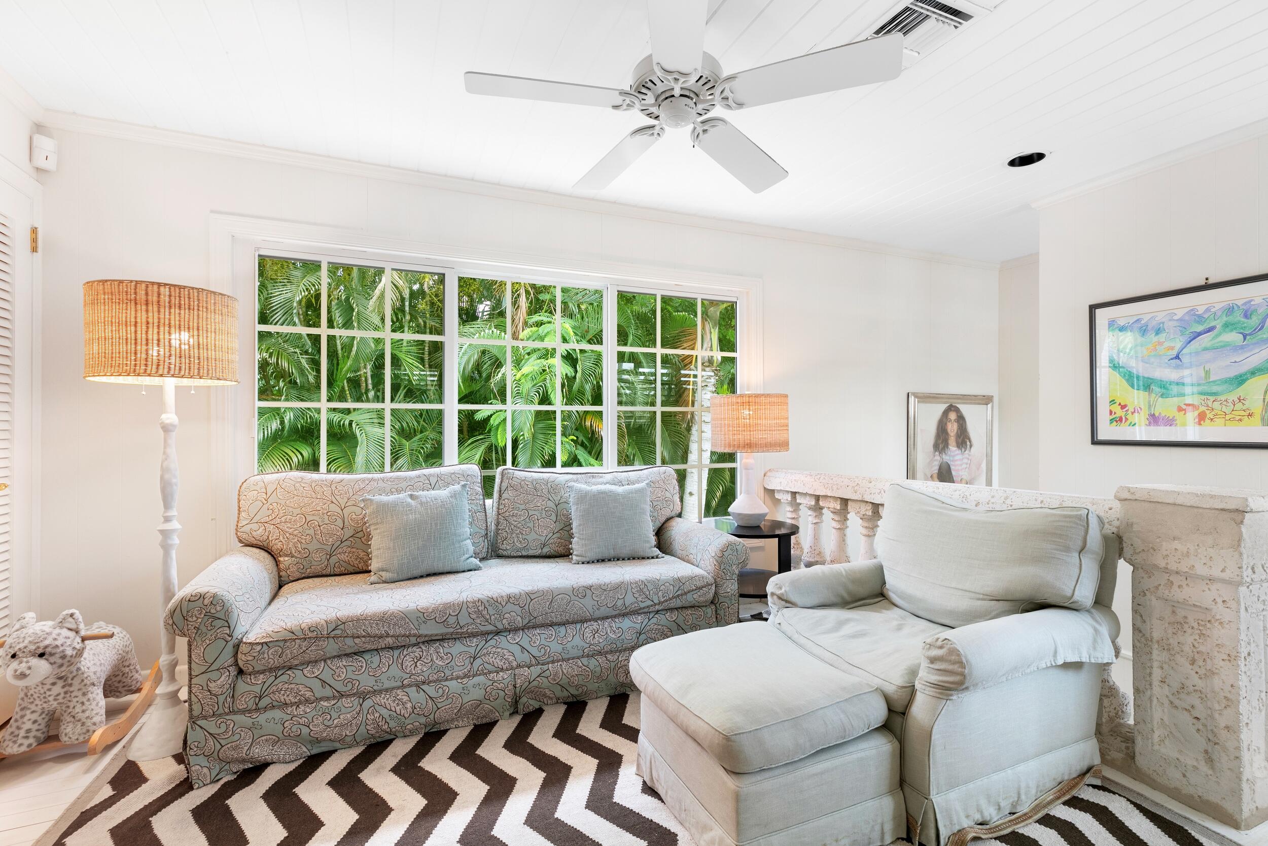 285 Orange Grove Road Palm Beach, FL 33480 - Photo 26 of 29 a living room with furniture and a large window