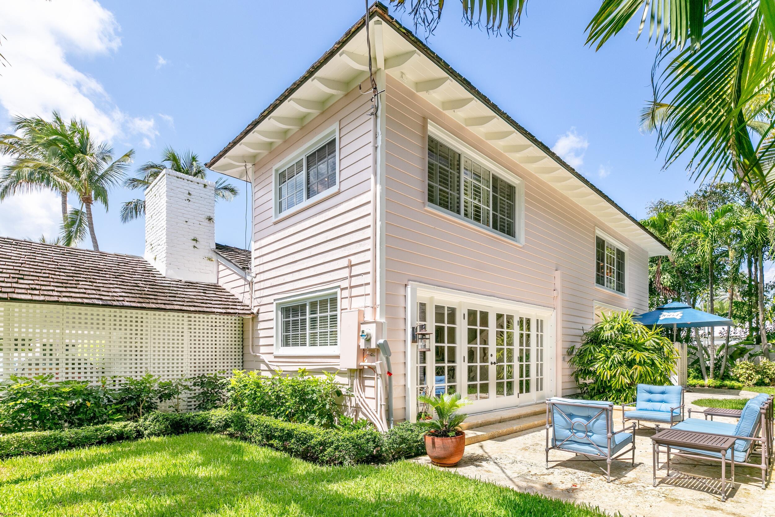 285 Orange Grove Road Palm Beach, FL 33480 - Photo 29 of 29 a view of a house with a yard and sitting area