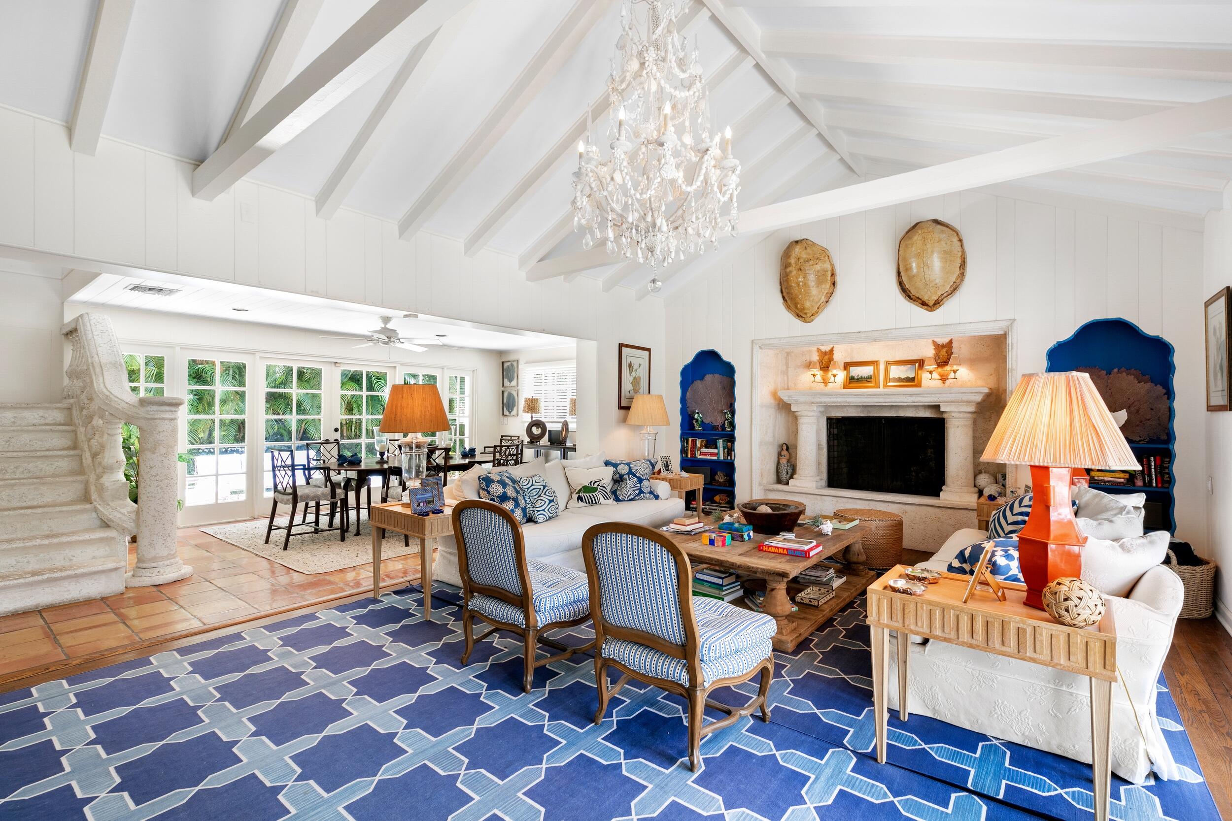 285 Orange Grove Road Palm Beach, FL 33480 - Photo 8 of 29 a living room with furniture and a chandelier