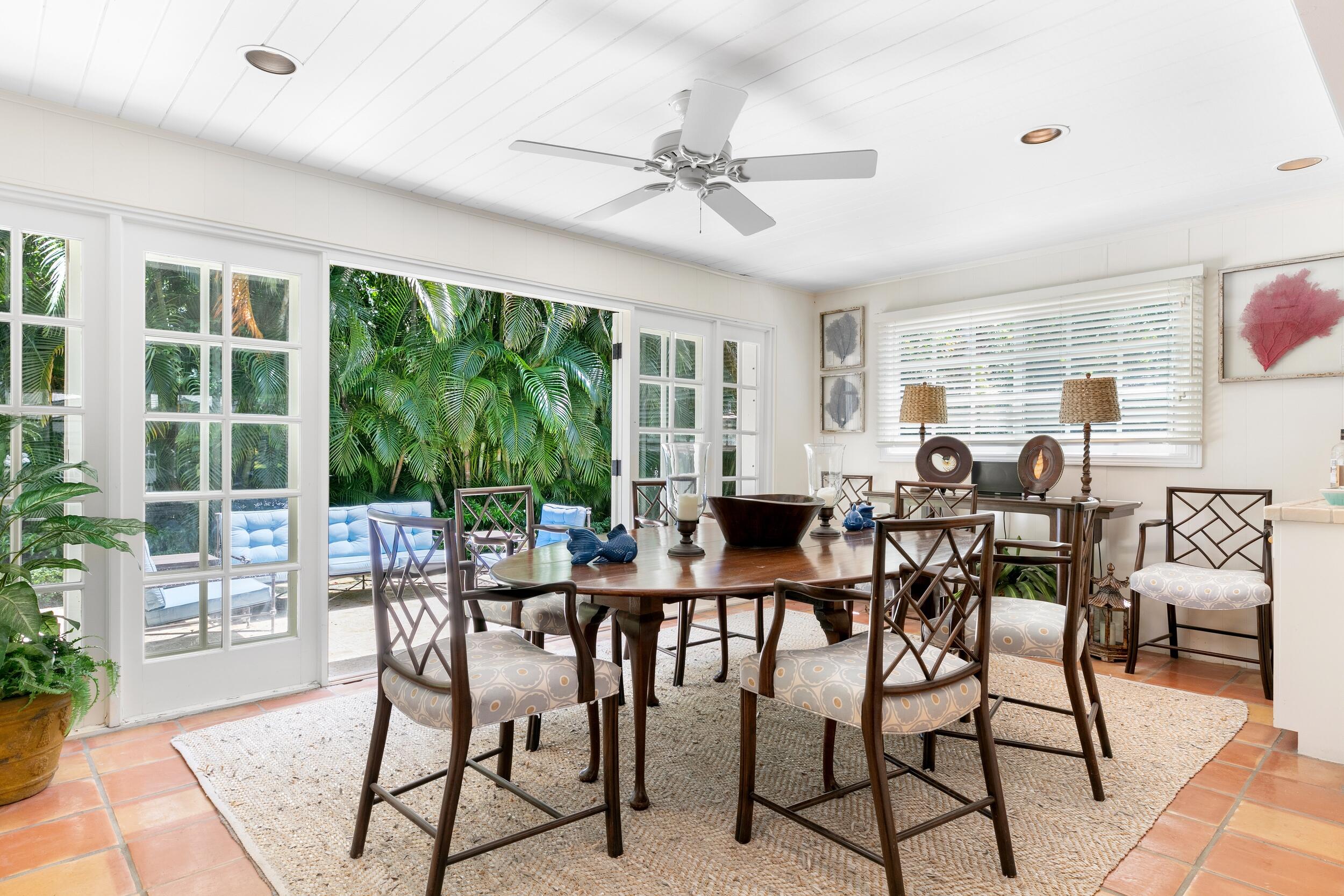 285 Orange Grove Road Palm Beach, FL 33480 - Photo 9 of 29 a view of a dining room with furniture window and outside view