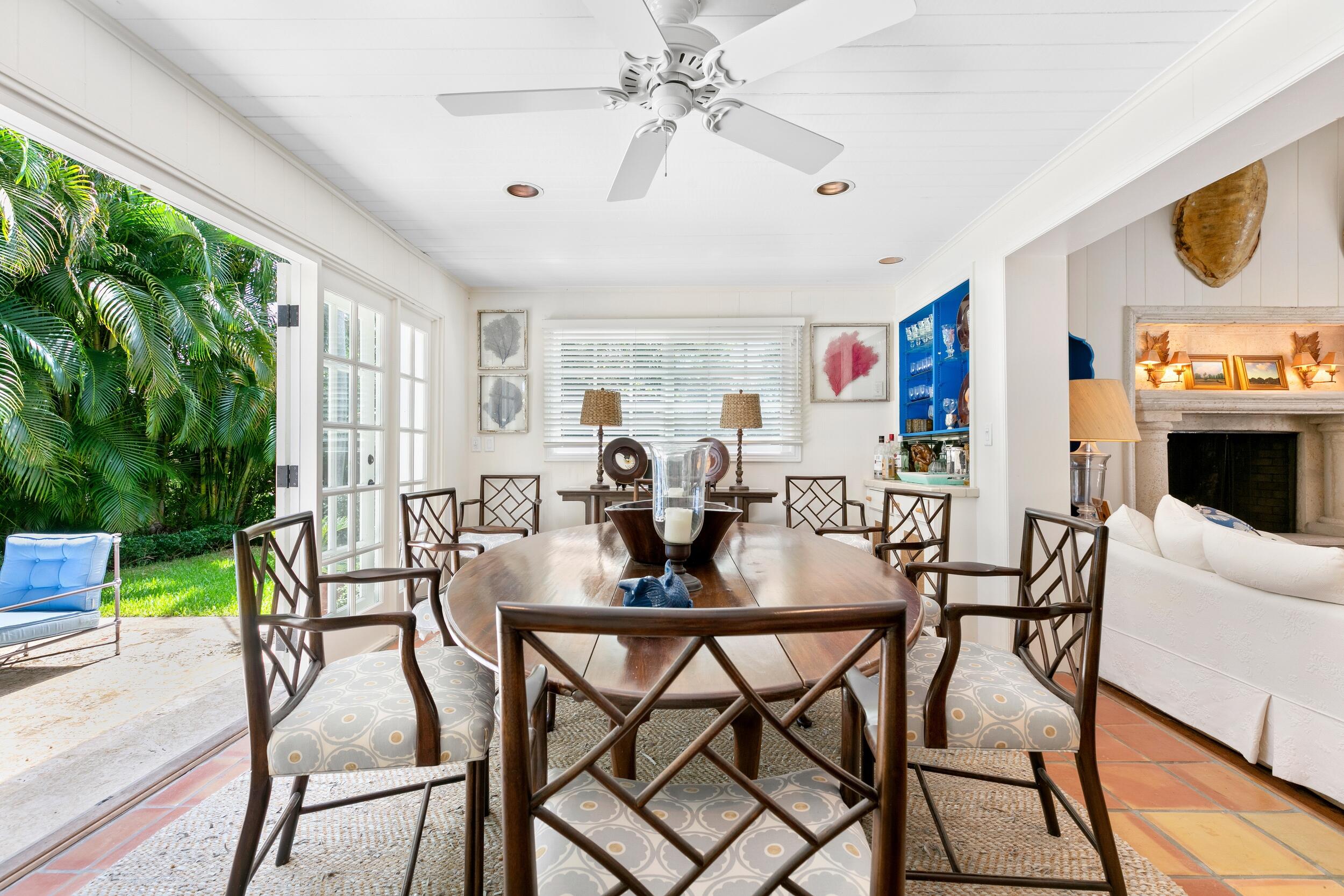 285 Orange Grove Road Palm Beach, FL 33480 - Photo 10 of 29 a view of a dining room with furniture window and outside view