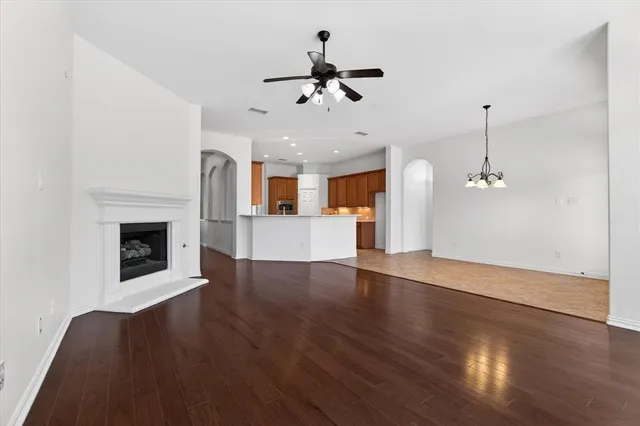 a view of a room with window and chandelier