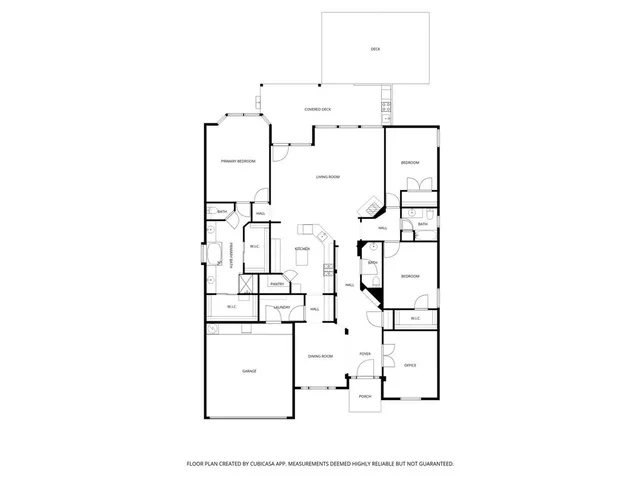 an empty room with wooden floor mirror and windows