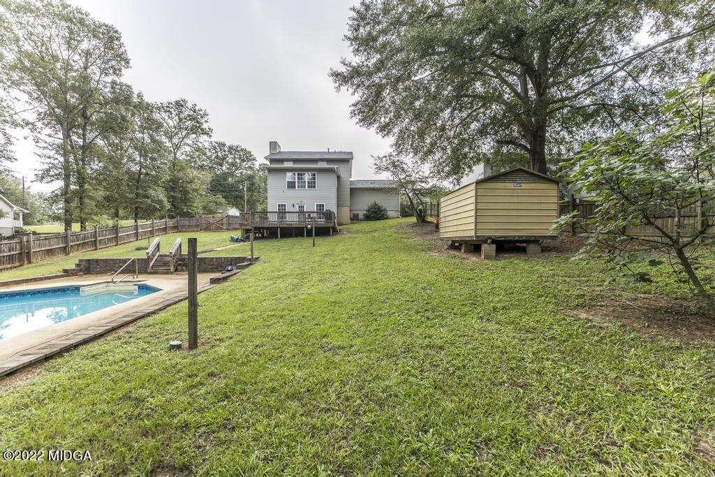 115 Coley Lake Road Macon, GA 31216 - Photo 39 of 42 a view of a house with a yard and sitting area