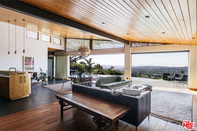 a living room with a couch and a table