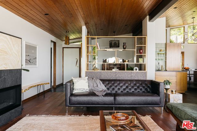 a view of a chairs and table in the patio