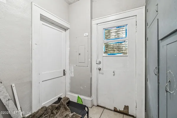 a view of a bathroom from a hallway