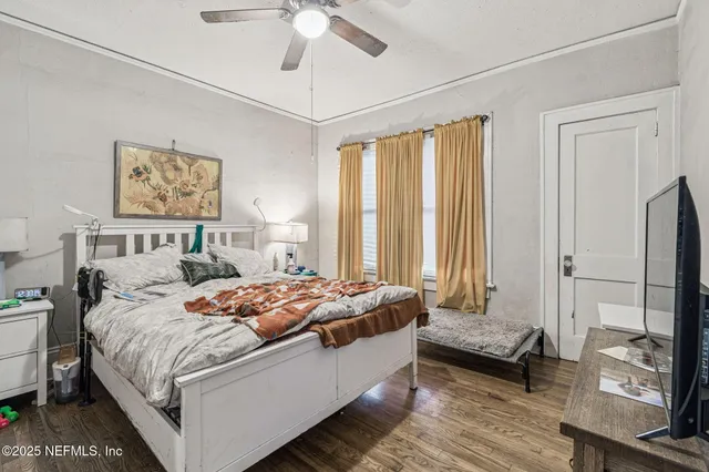 a view of a backyard and trees