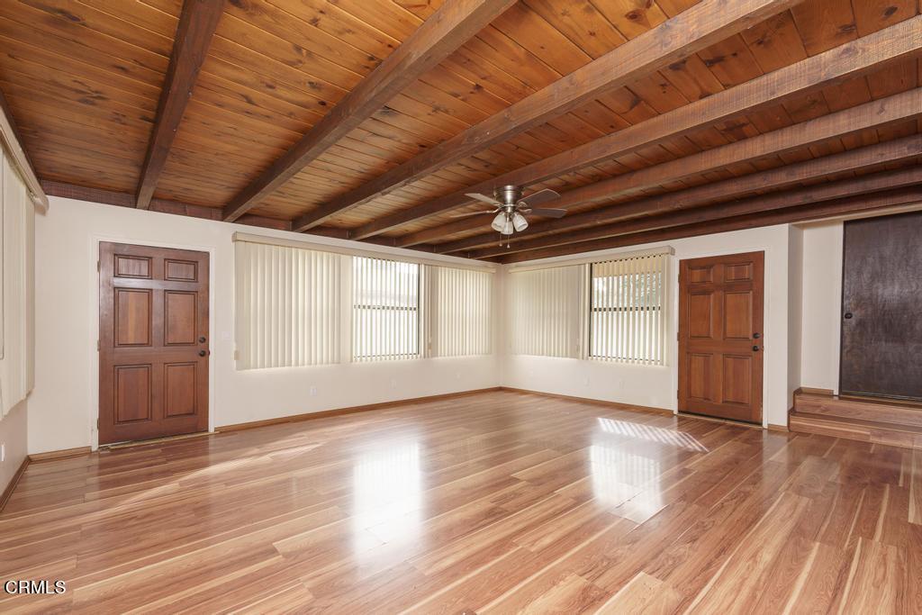 1060 Spring Street Oak View, CA 93022 - Photo 16 of 33 a view of an empty room with wooden floor and a window