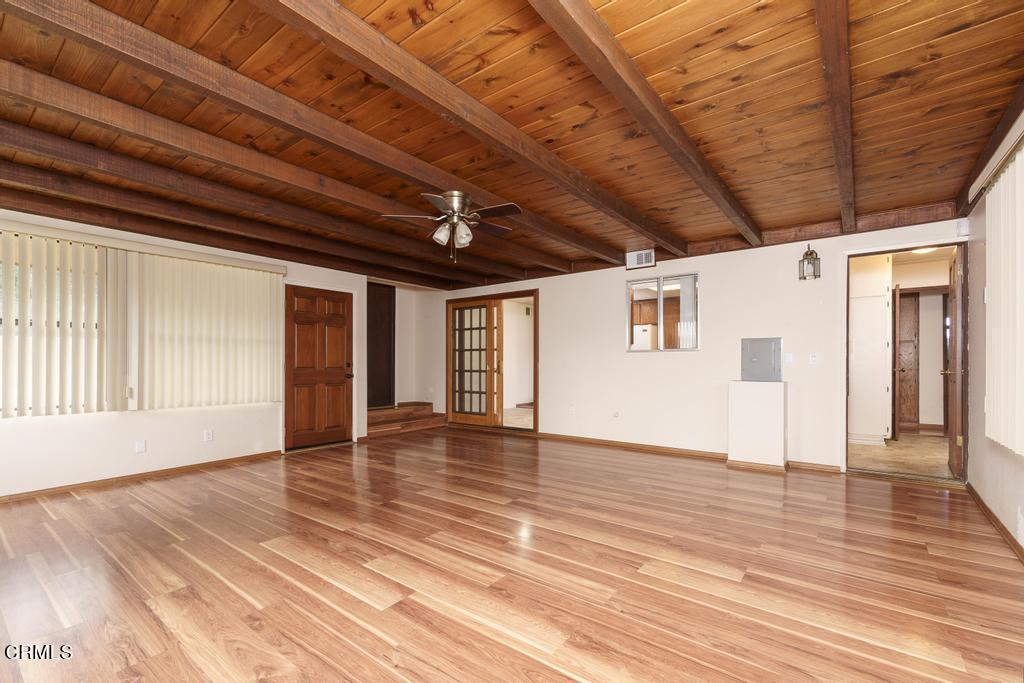 1060 Spring Street Oak View, CA 93022 - Photo 17 of 33 a view of an empty room with wooden floor and a window