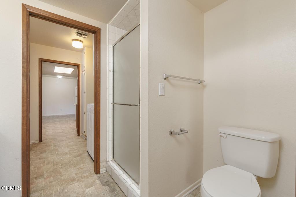 1060 Spring Street Oak View, CA 93022 - Photo 26 of 33 a bathroom with a toilet and a shower