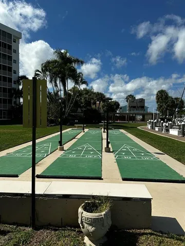 a bedroom with furniture and a chandelier