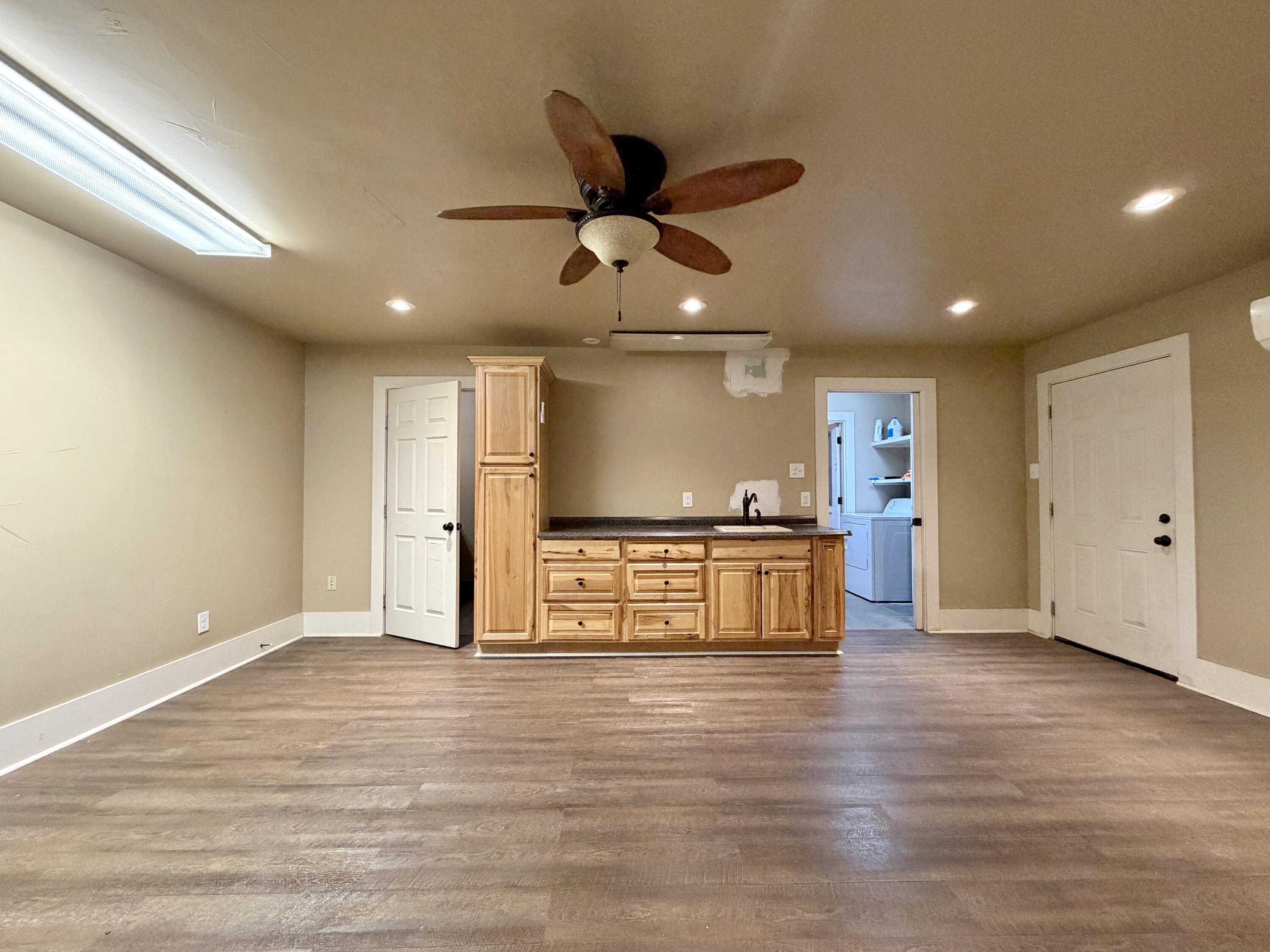 4401 28th Street Lubbock, TX 79410 - Photo 21 of 25 a view of kitchen with refrigerator and microwave