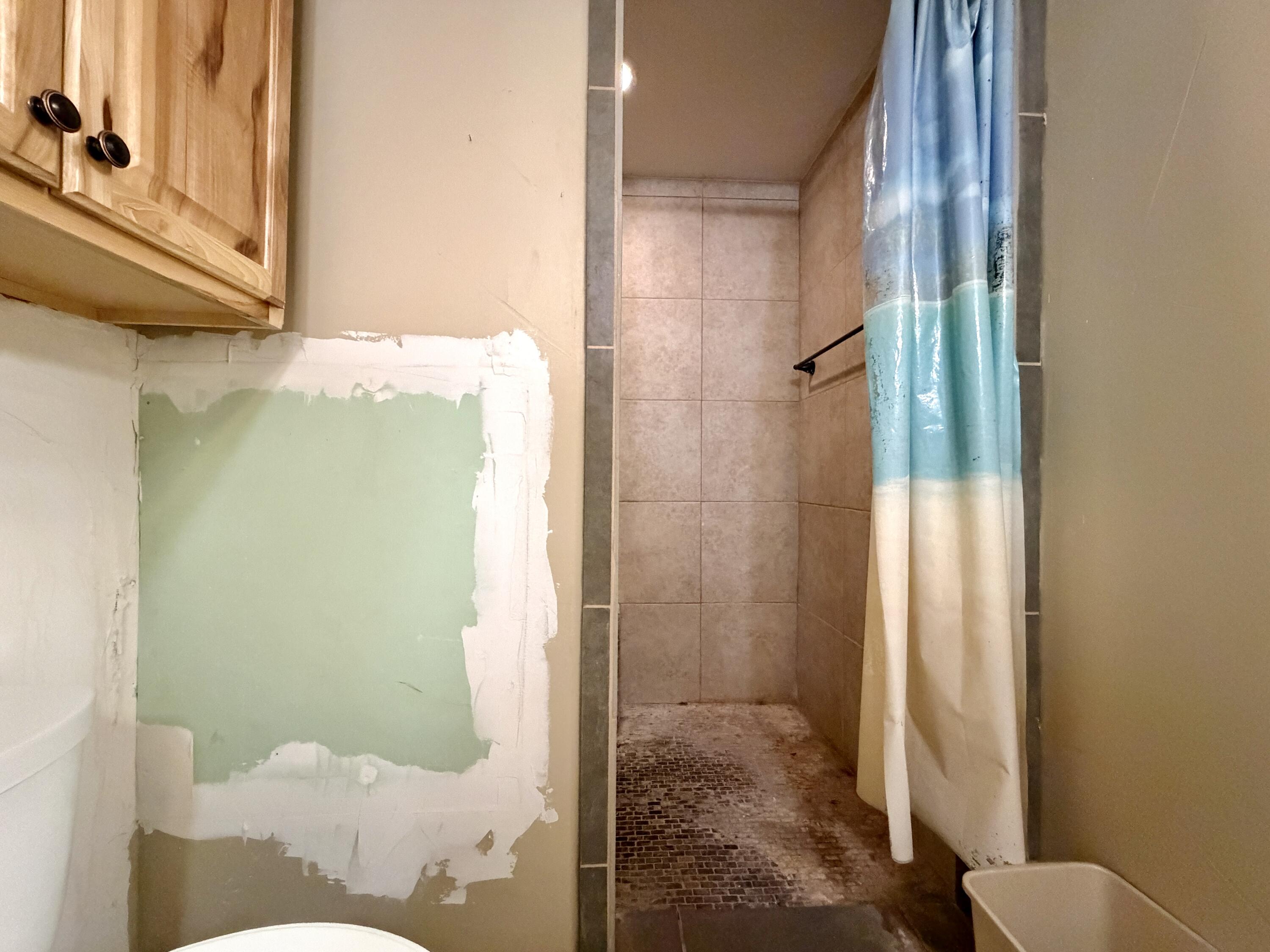 4401 28th Street Lubbock, TX 79410 - Photo 24 of 25 a bathroom with a shower