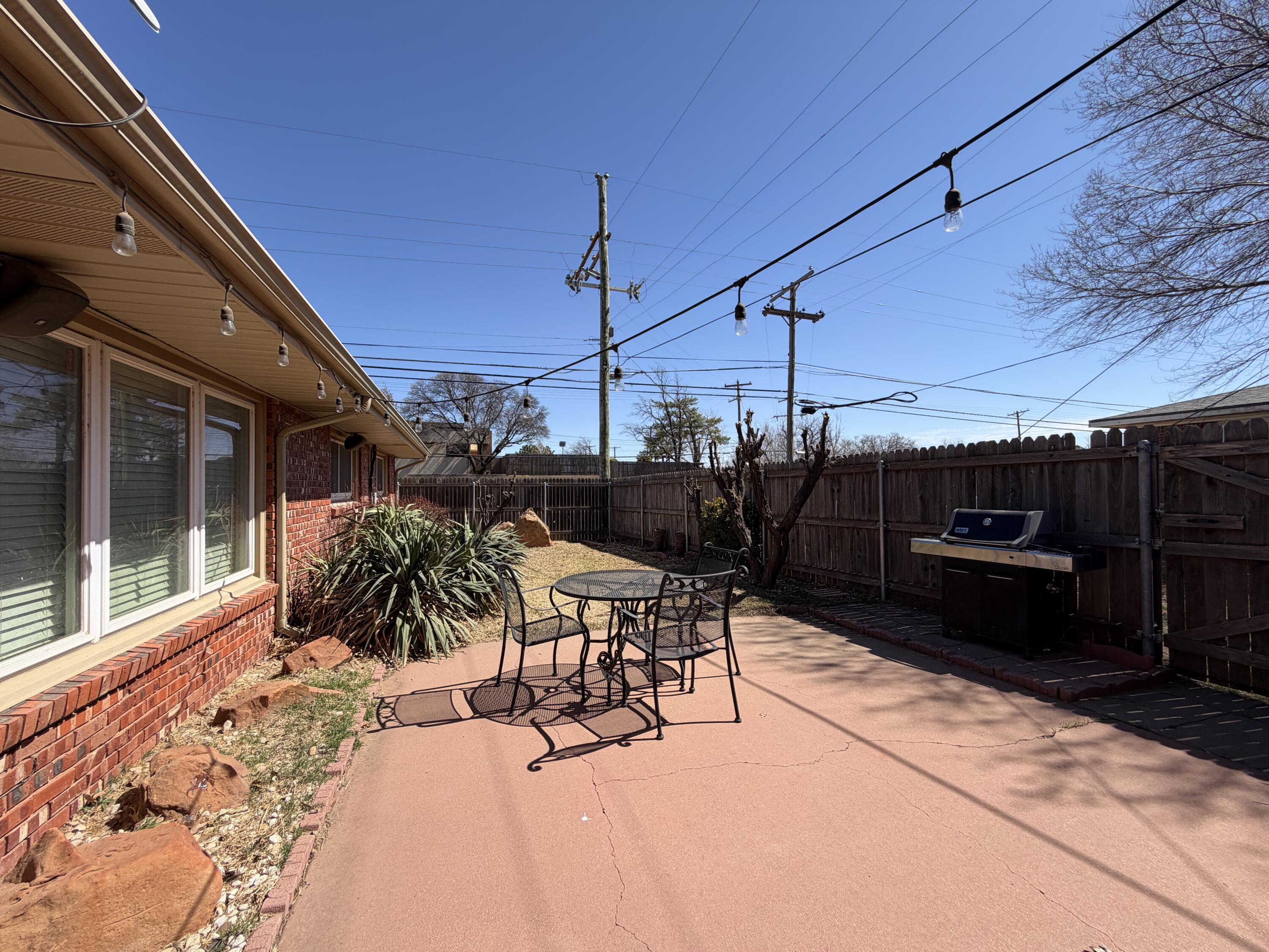 4401 28th Street Lubbock, TX 79410 - Photo 25 of 25 a view of a backyard with sitting area