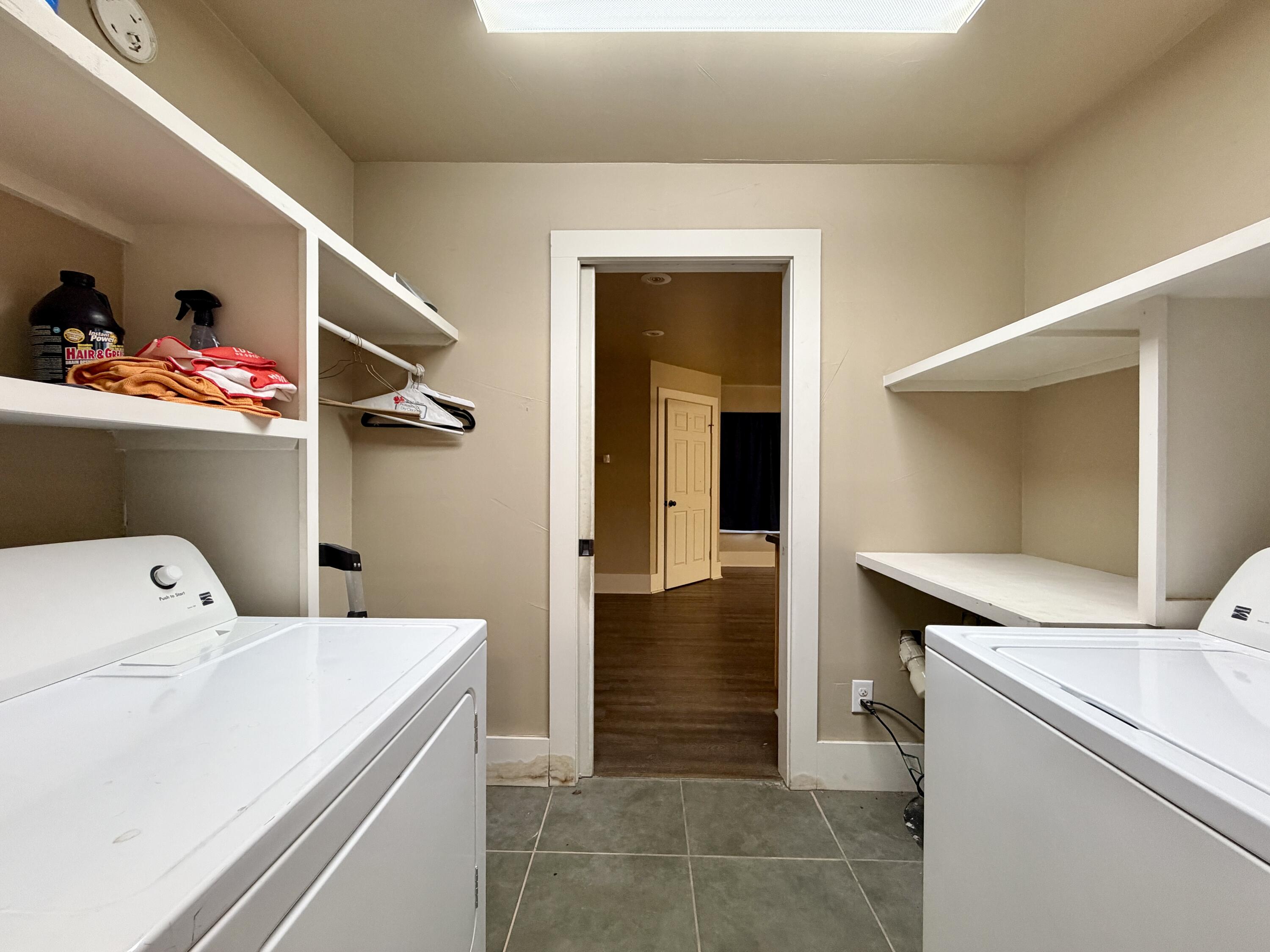 4401 28th Street Lubbock, TX 79410 - Photo 9 of 25 a utility room with dryer and washer