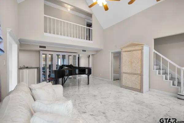 a kitchen with stainless steel appliances granite countertop a sink and a stove
