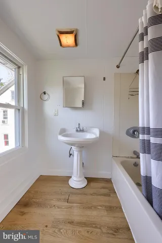 a bathroom with a sink and a bathtub