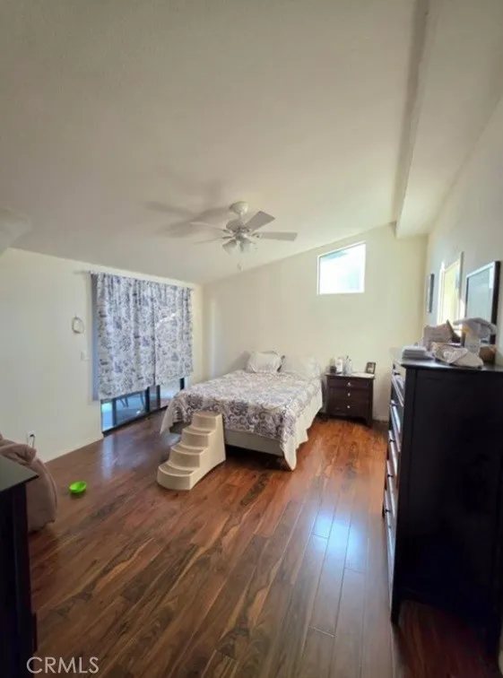 27250 Murrieta Road, Unit 390 Menifee, CA 92586 - Photo 20 of 30 a living room with furniture and wooden floor