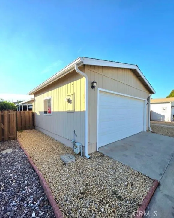 27250 Murrieta Road, Unit 390 Menifee, CA 92586 - Photo 3 of 30 a view of a house with a backyard