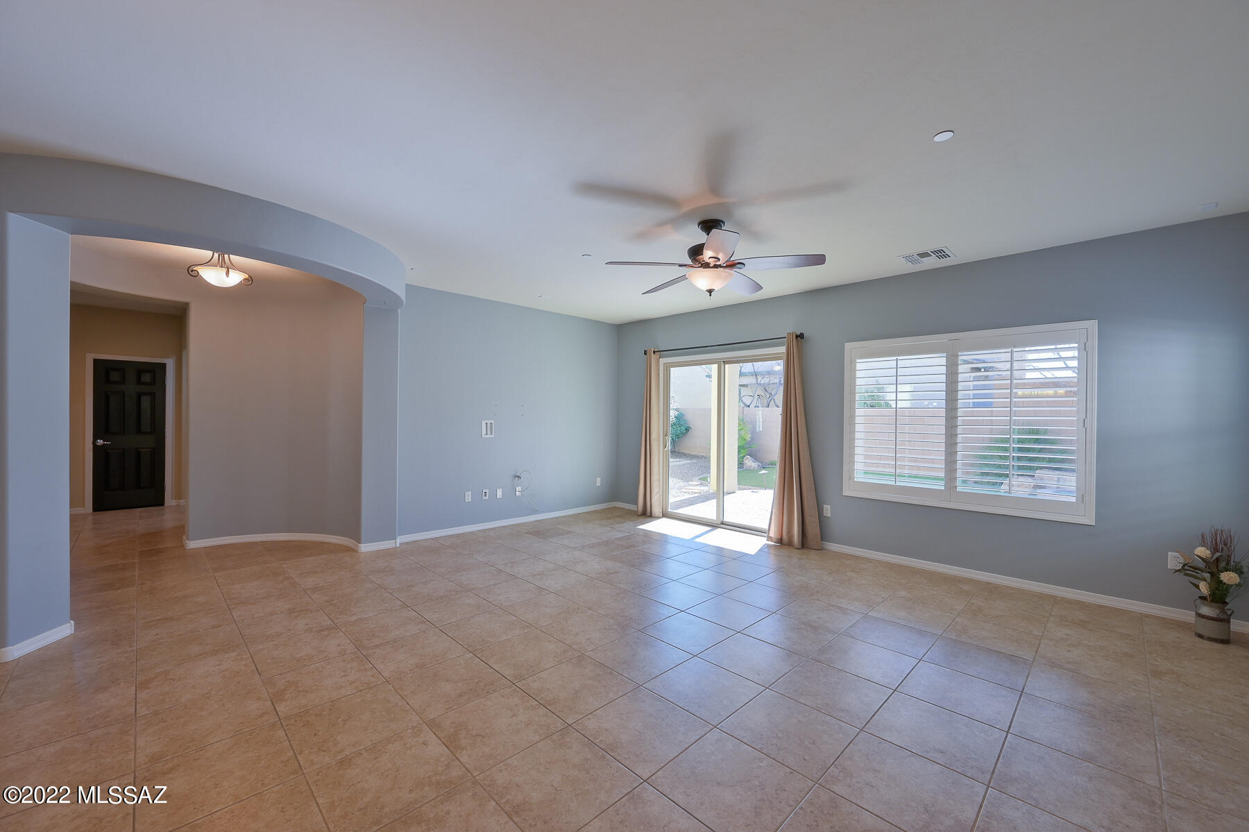10804 East Salsabila Road Tucson, AZ 85747 - Photo 4 of 50 a view of an empty room with a window