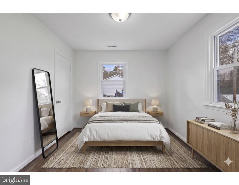 16206 Ashbox Road Brandywine, MD 20613 - Photo 20 of 20 Serene bedroom with natural light.