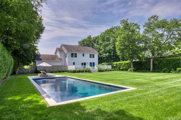 a view of a house with a big yard
