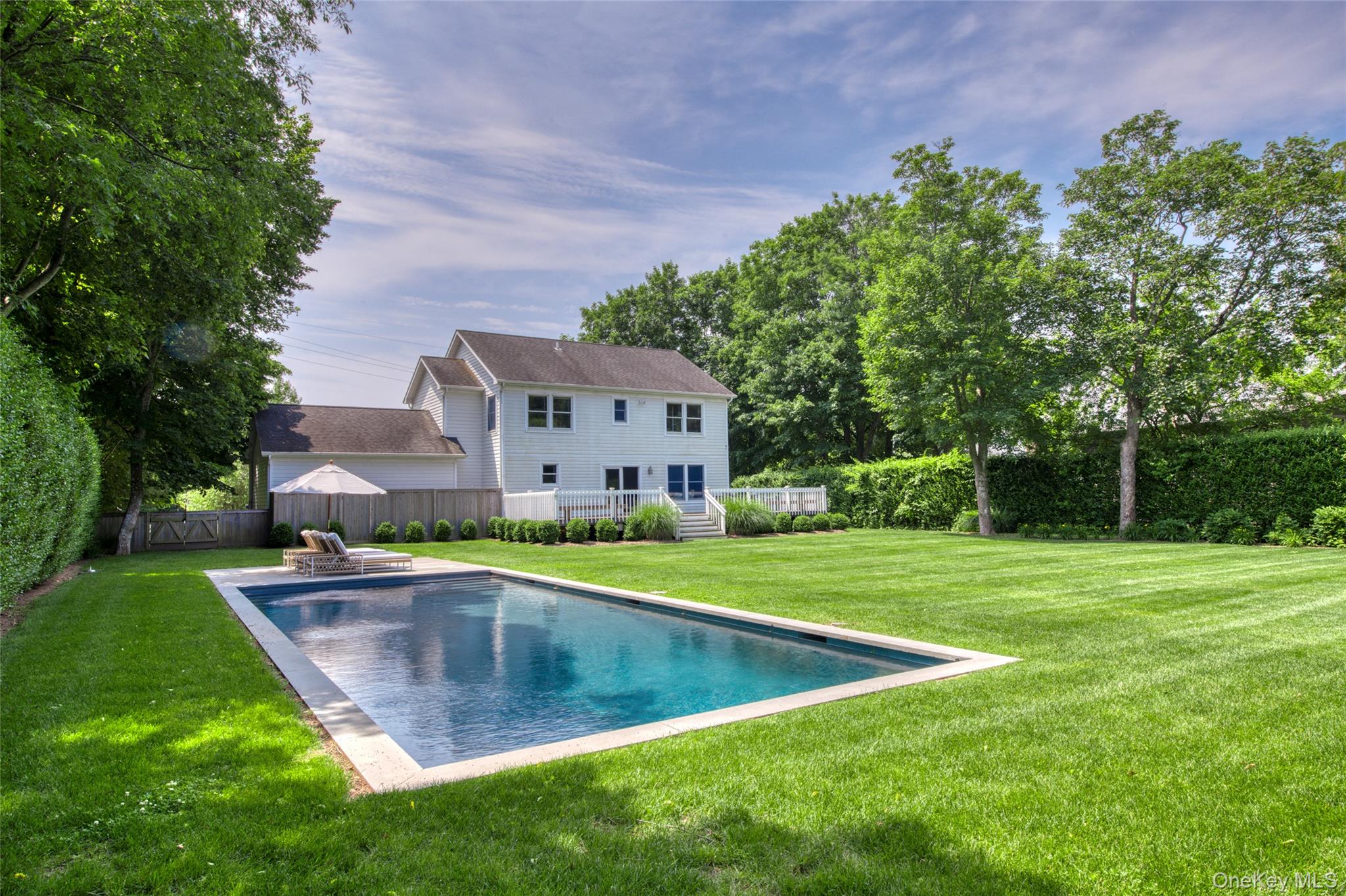 a view of a house with a big yard