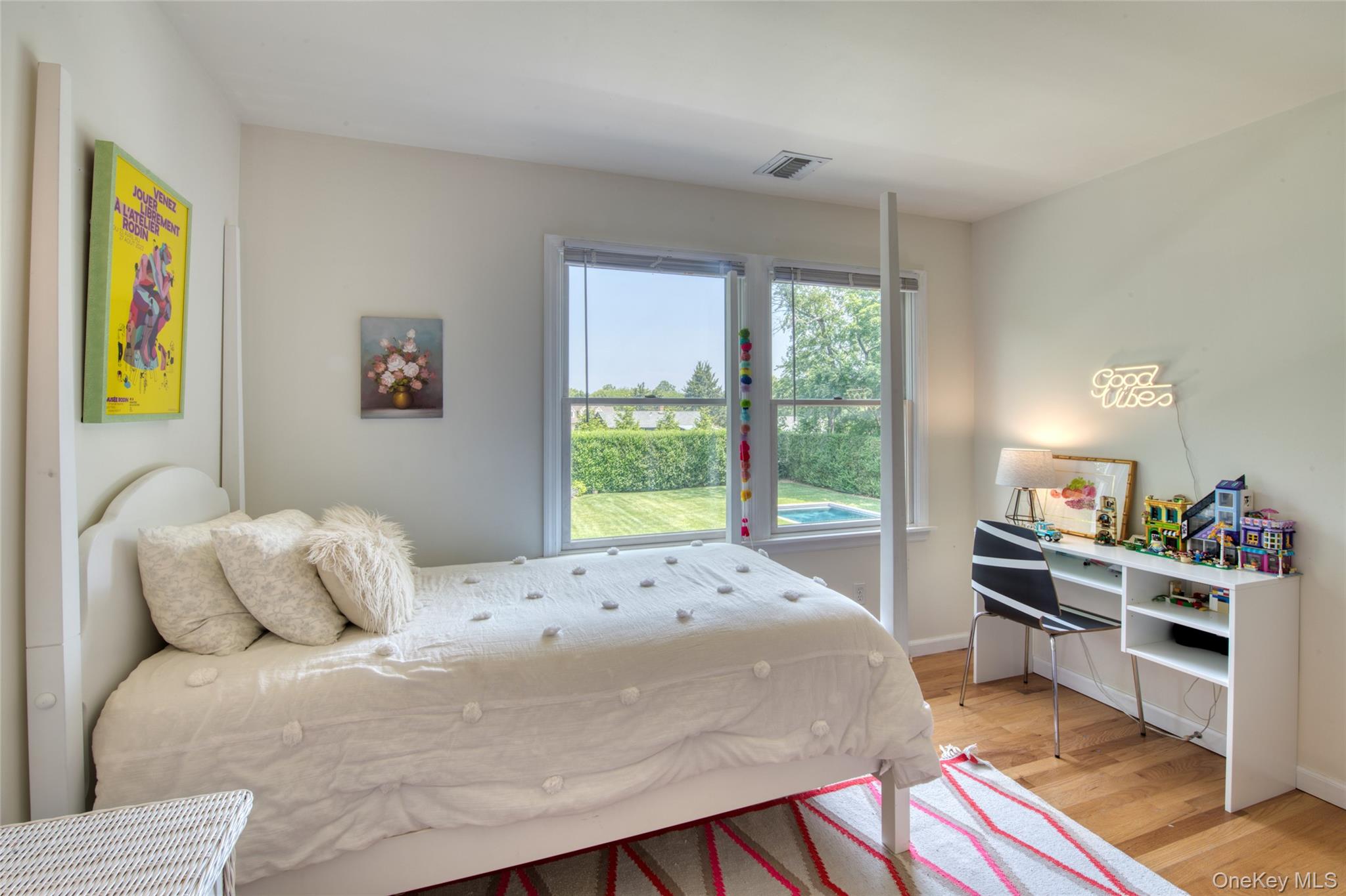 39595 Main Road Orient, NY 11957 - Photo 11 of 15 a bedroom with a bed and a window