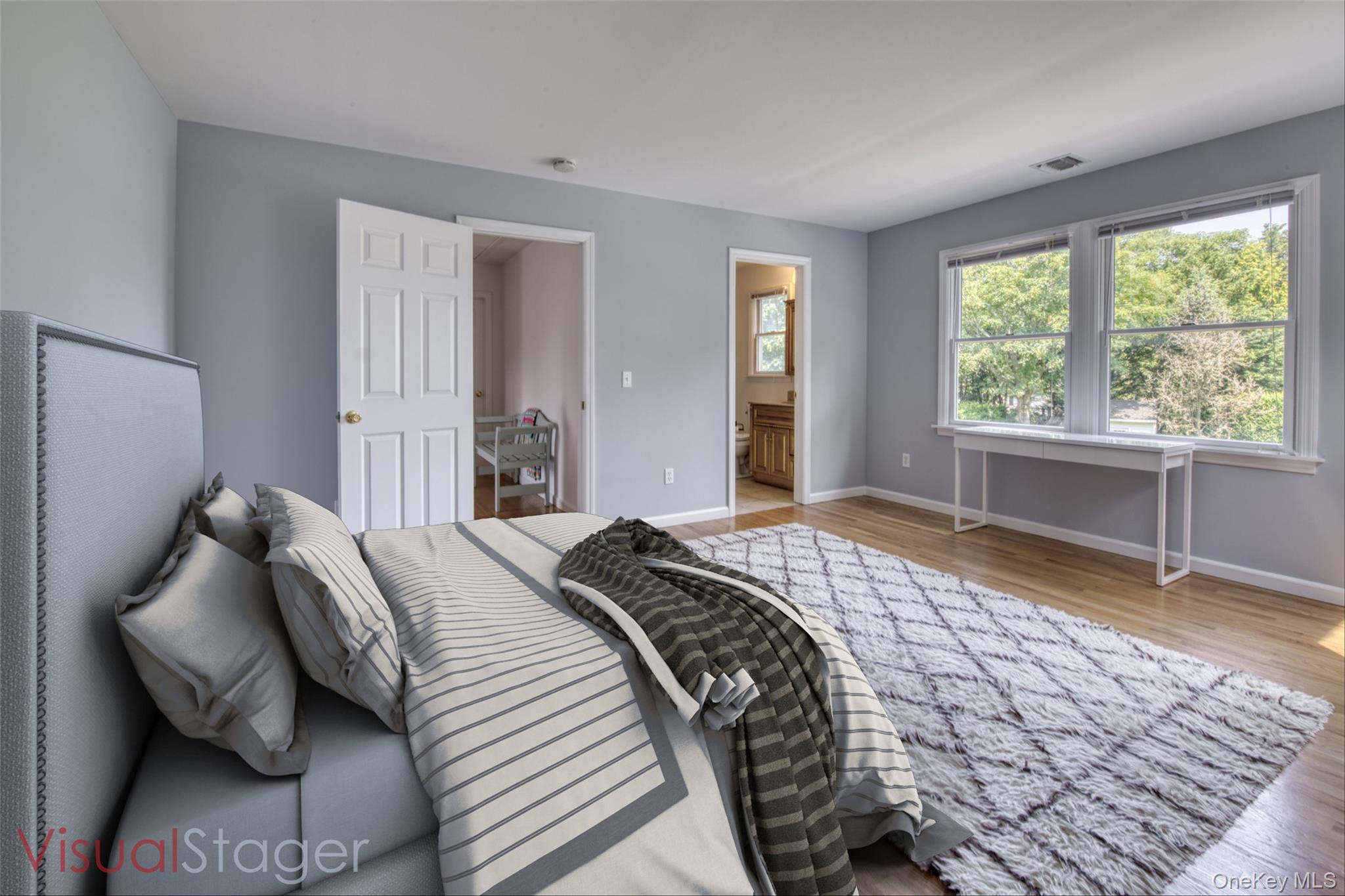 39595 Main Road Orient, NY 11957 - Photo 8 of 15 a bedroom with a bed and a window