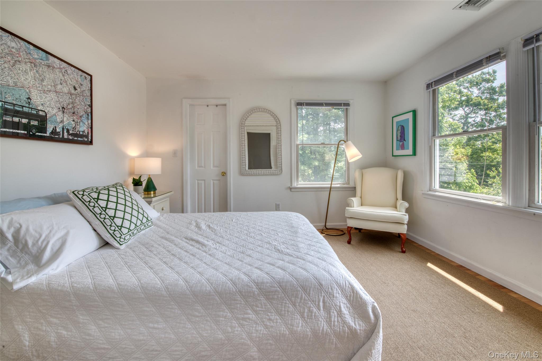 39595 Main Road Orient, NY 11957 - Photo 9 of 15 a bedroom with a bed and a window