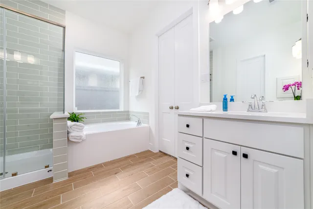 a bathroom with a sink and a bathtub