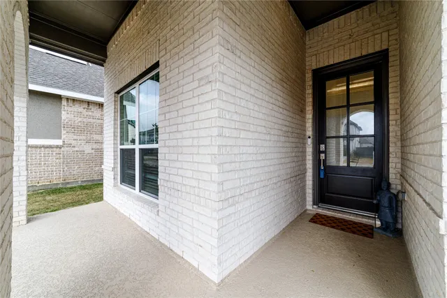 a view of outdoor space and front view of a house