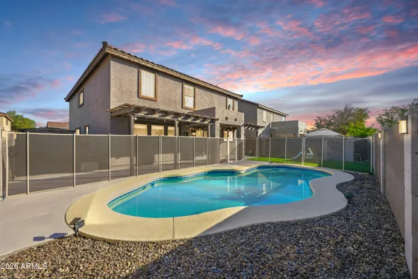 a front view of a house with yard