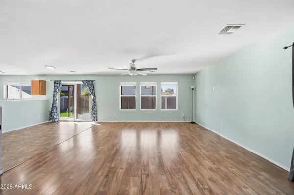 wooden floor in a hall with an entryway