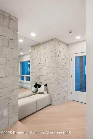 a view of kitchen with furniture and wooden floor