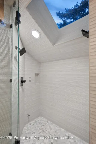 a workspace with furniture and a window