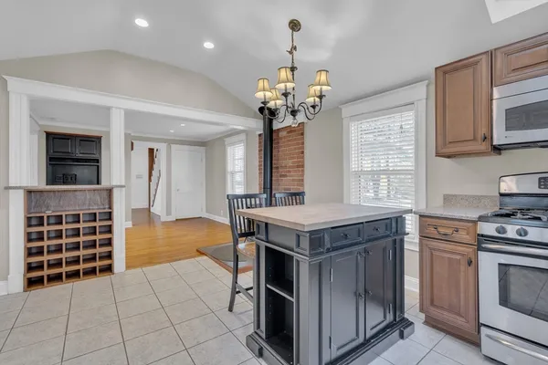 a kitchen with a stove and a sink