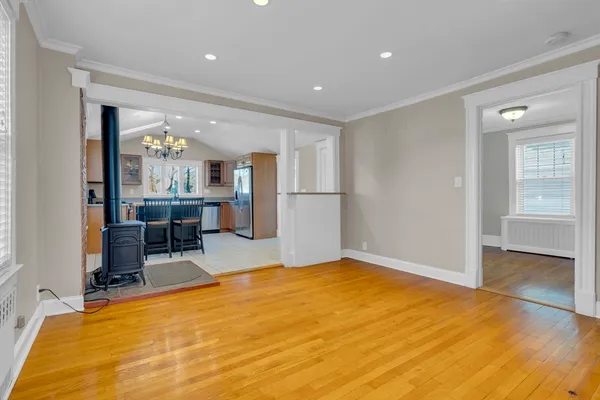 a view of a livingroom with furniture and a window