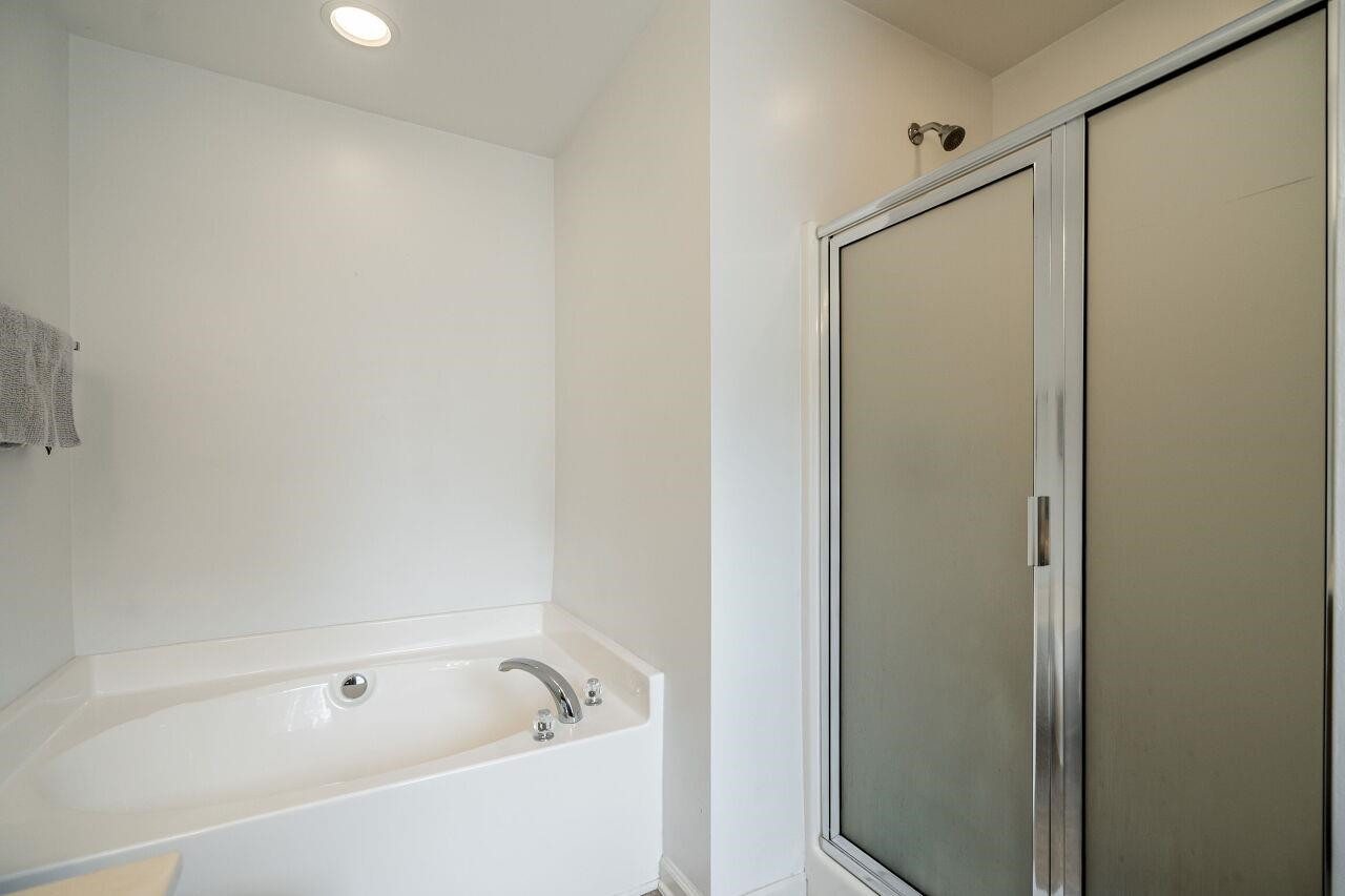 4638 Altha Street Raleigh, NC 27606 - Photo 21 of 27 Tub and Separate Shower