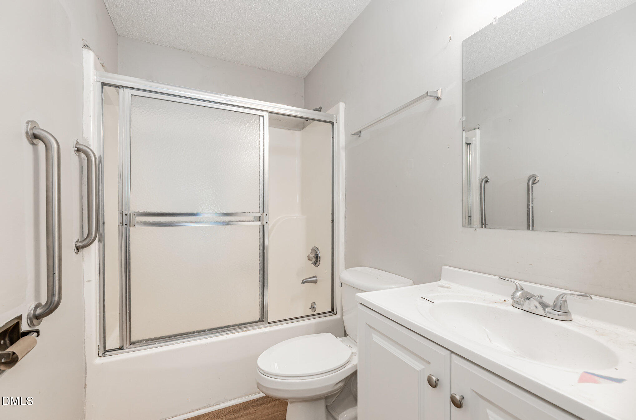 517 Carter Road Graham, NC 27253 - Photo 17 of 27 a bathroom with a granite countertop sink toilet and shower