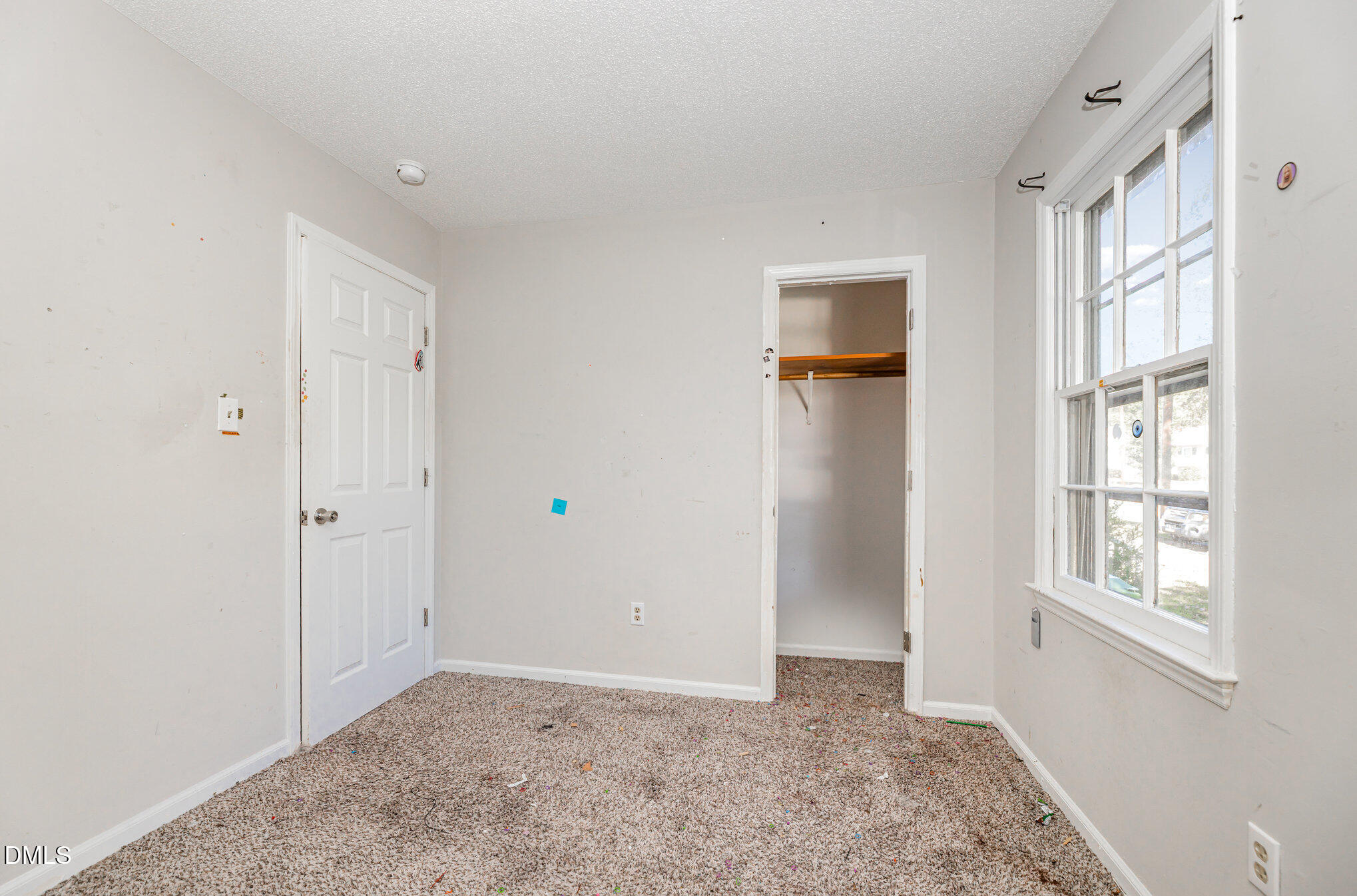 517 Carter Road Graham, NC 27253 - Photo 19 of 27 a view of an empty room with a window