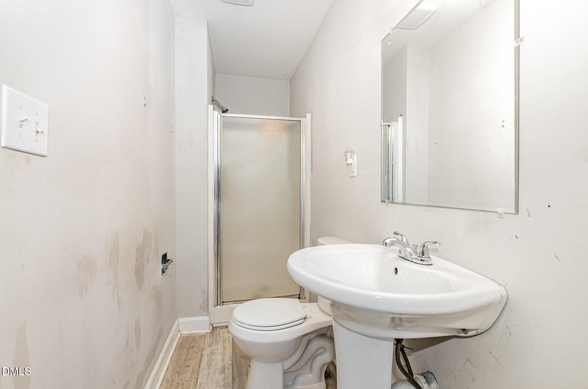 517 Carter Road Graham, NC 27253 - Photo 22 of 27 a bathroom with a sink a toilet and a mirror