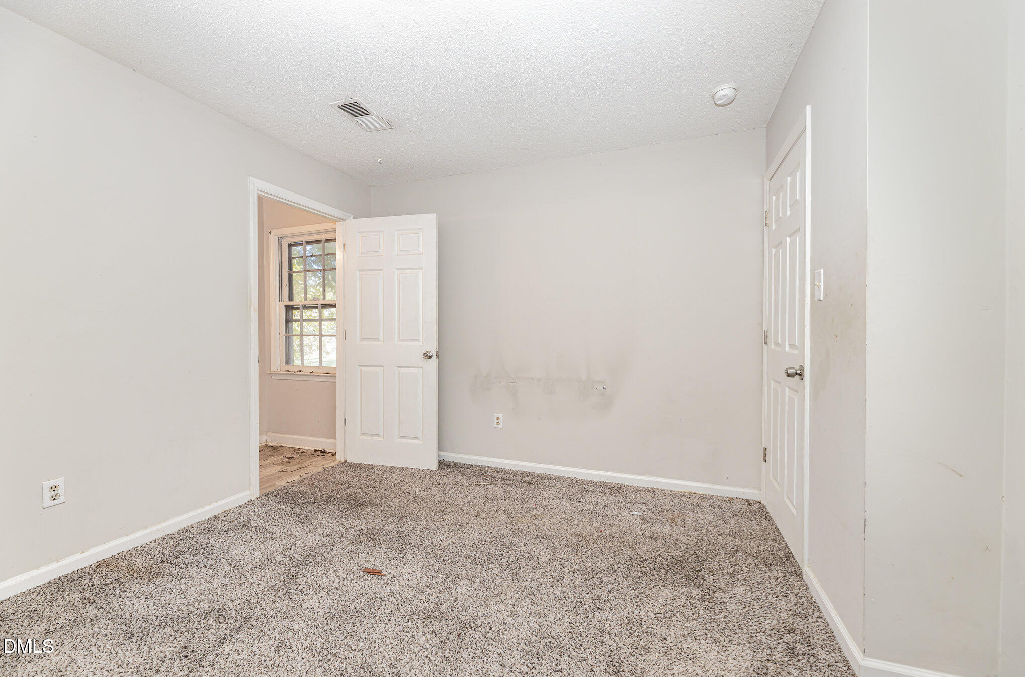 517 Carter Road Graham, NC 27253 - Photo 23 of 27 an empty room with windows