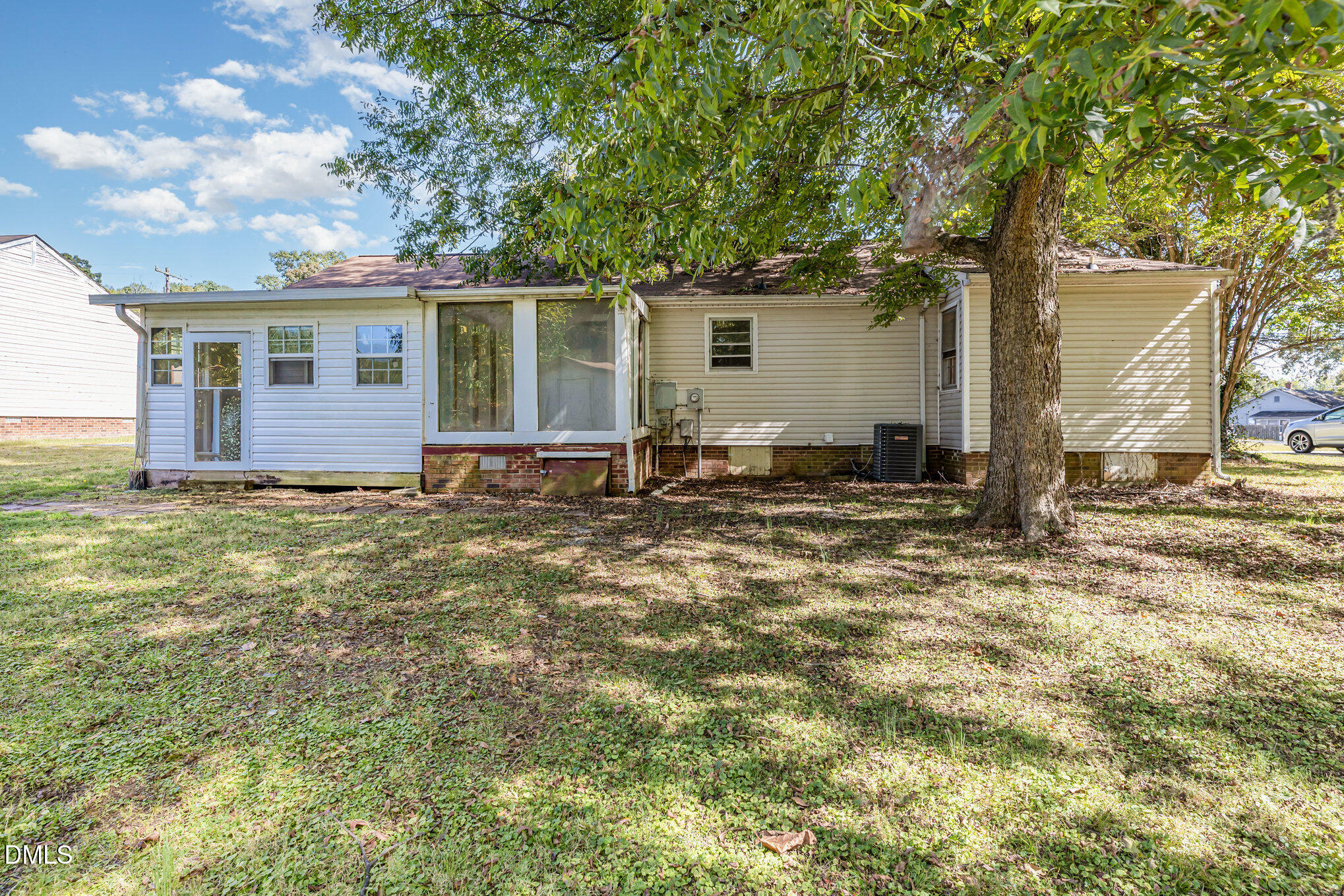 517 Carter Road Graham, NC 27253 - Photo 25 of 27 a backyard of a house with yard and outdoor seating
