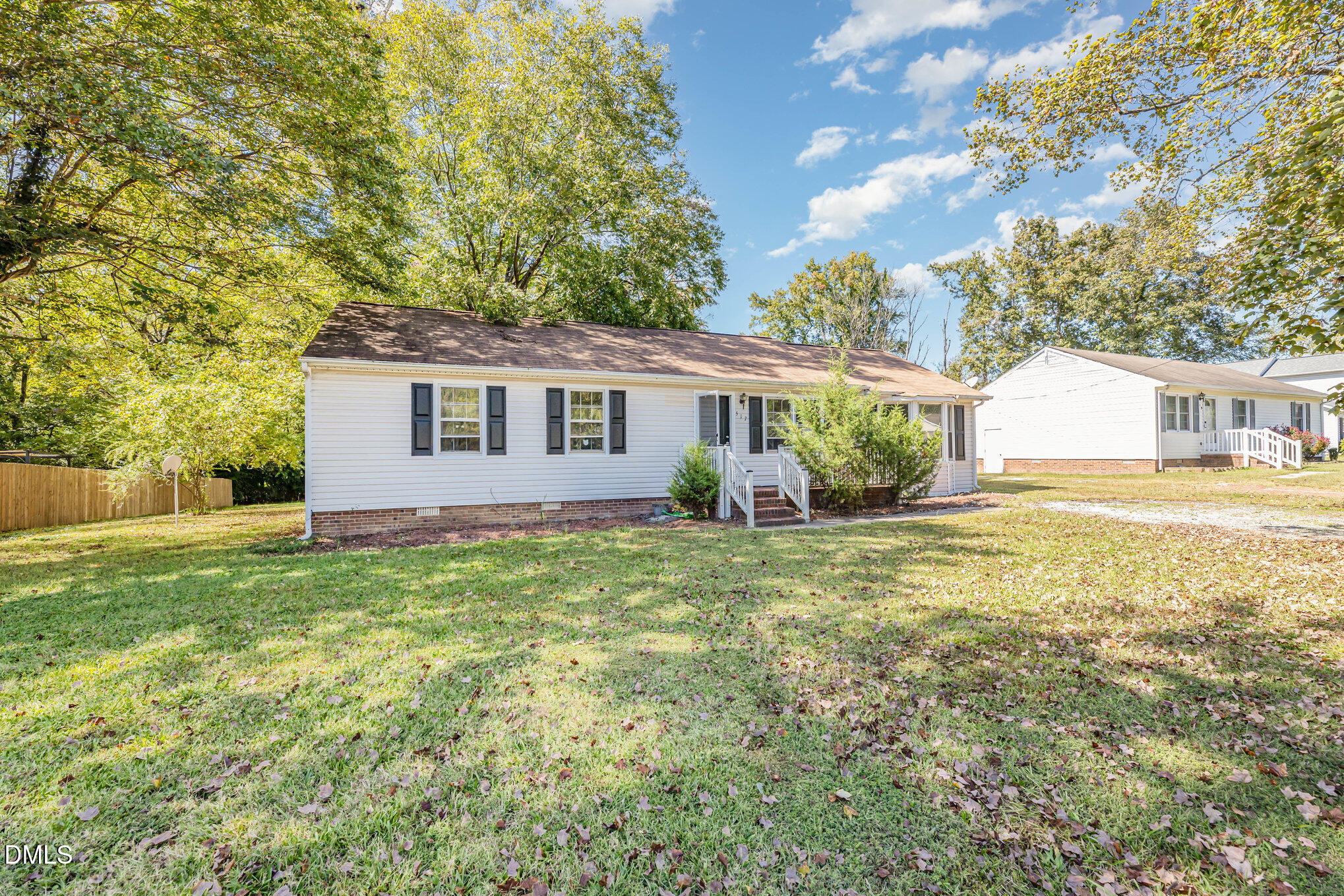 517 Carter Road Graham, NC 27253 - Photo 3 of 27 a house view with a garden space