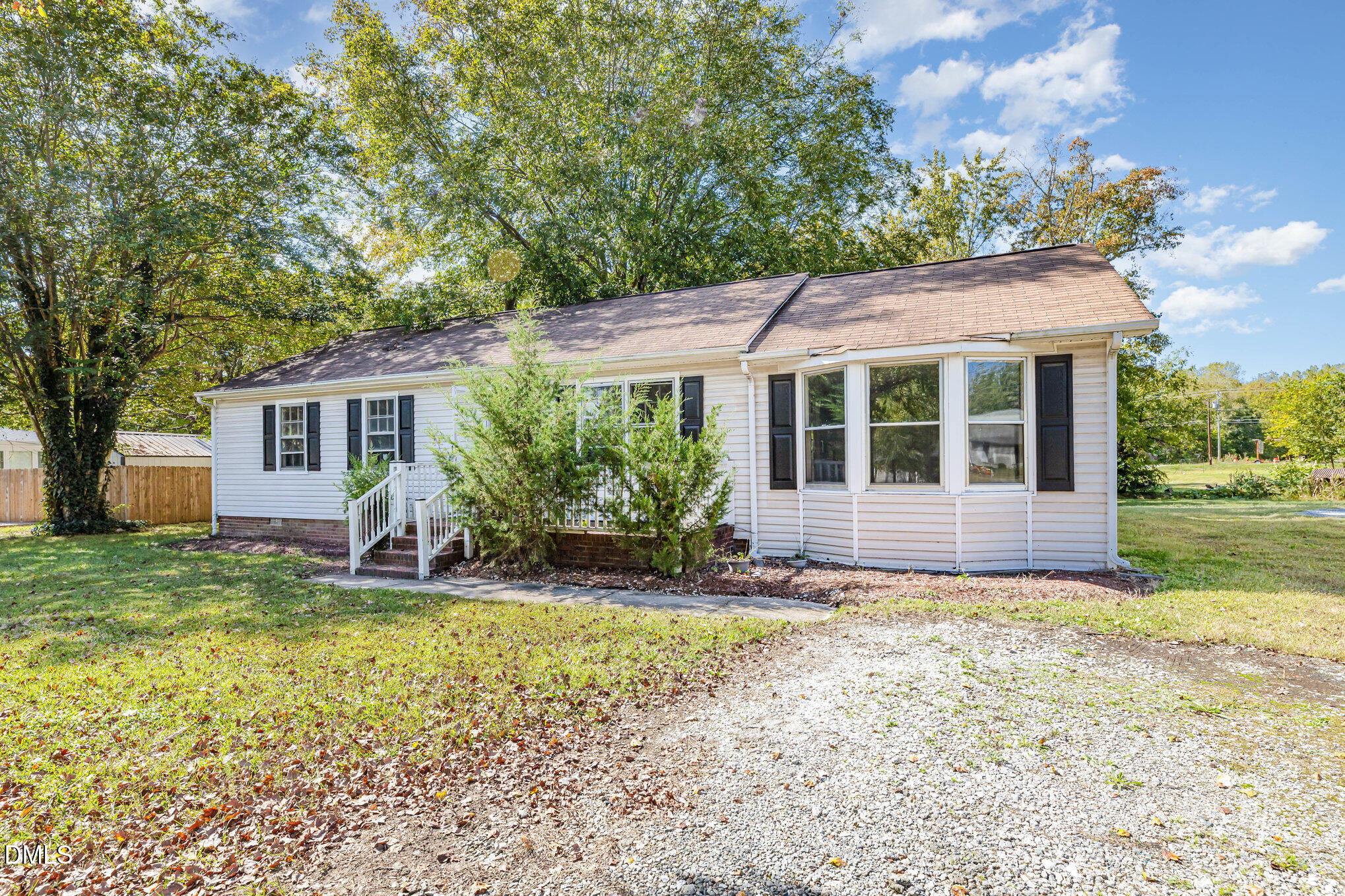 517 Carter Road Graham, NC 27253 - Photo 4 of 27 a view of a house with a yard