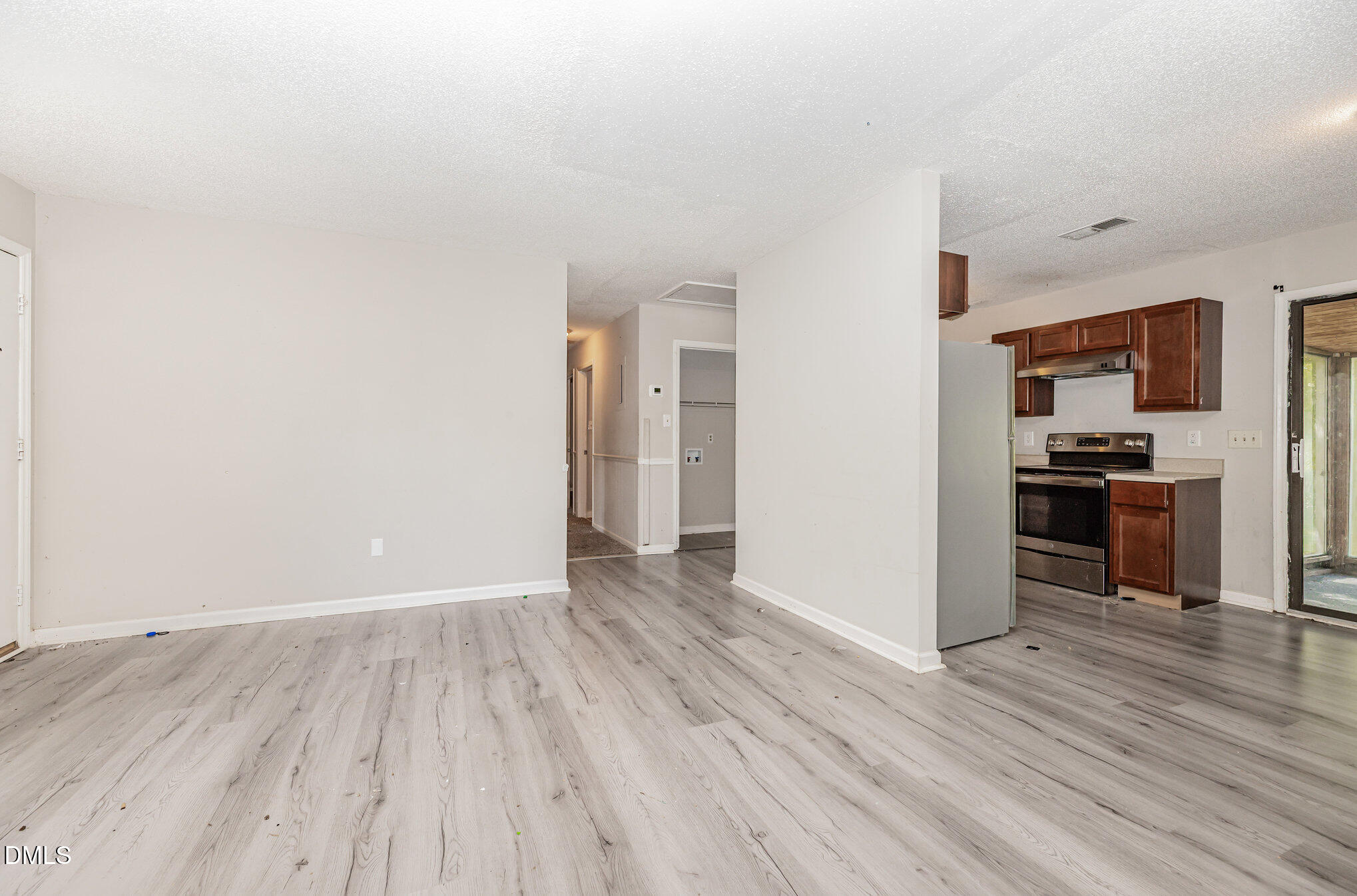 517 Carter Road Graham, NC 27253 - Photo 7 of 27 a view of a kitchen from the hallway