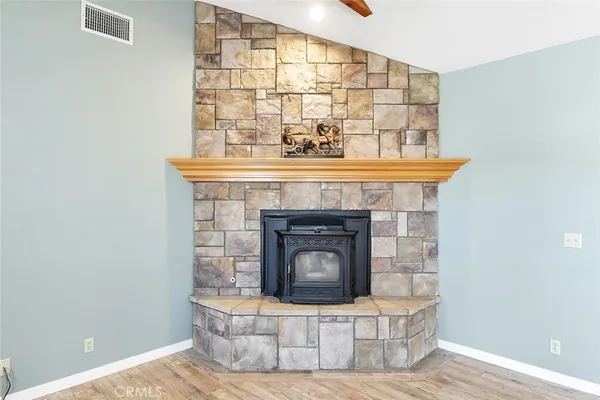 a kitchen with stainless steel appliances a refrigerator sink and microwave