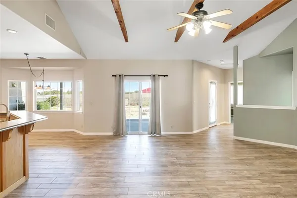 a kitchen with a sink and a window